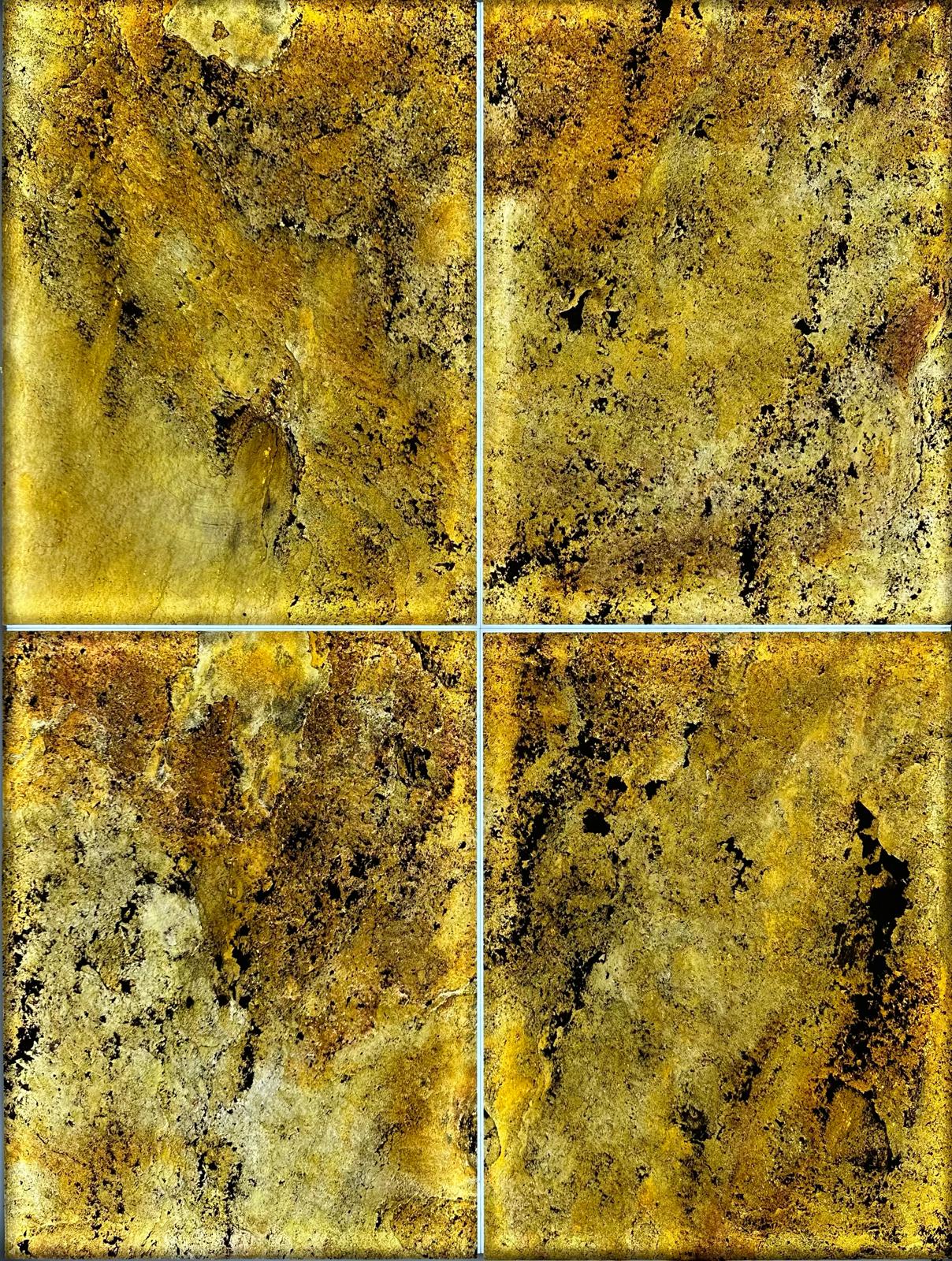 Photo of four luminous tiles, Himalaya Gold reference for the stone leaf. A very warm texture and a very classy finish
